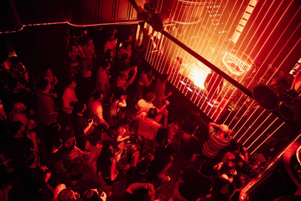 Crowd on the dancefloor at Mustache Bangkok, house and techno club in Silom