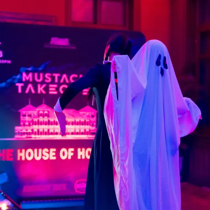 Ghost costume at Mustache Takeover The House of Horror