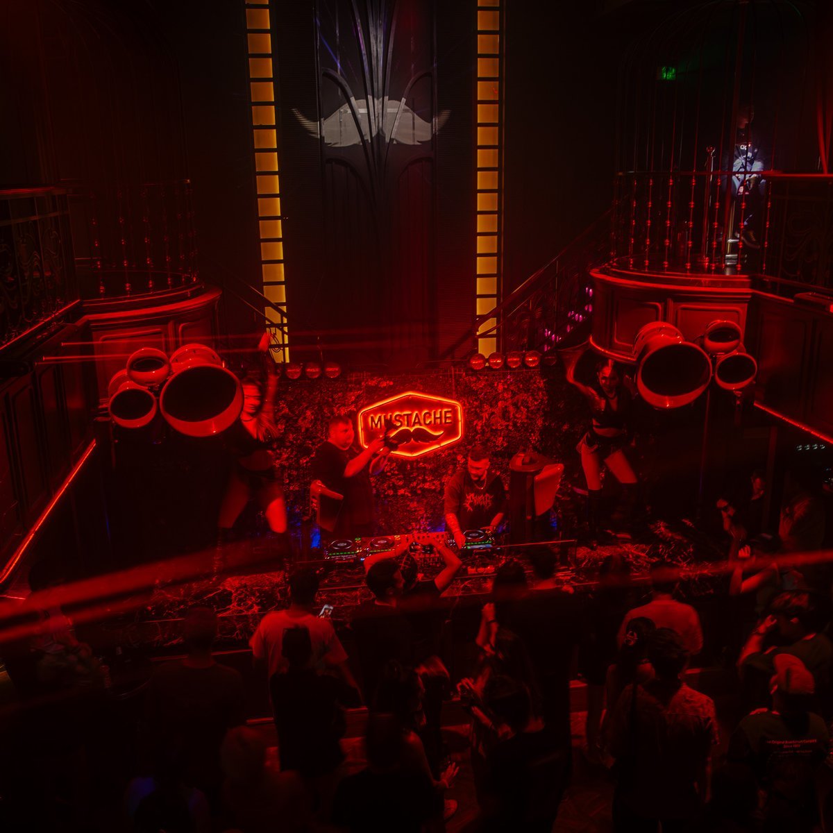 DJ booth and crowd from above at Mustache Bangkok